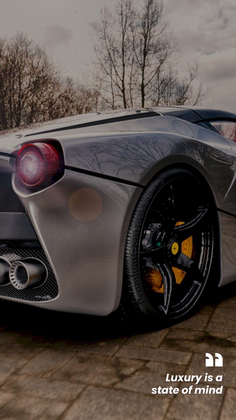 4K silver Ferrari super car wallpaper featuring luxury sports cars with sharp details, aerodynamic design, and high-performance style — ultra HD car background available for free on Zonwalls.