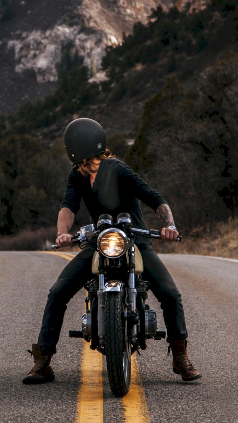 mottos Harley Davidson wallpaper showing bikes on scenic roads, detailed landscapes, and ultra HD clarity — free motorcycle background on Zonwalls.