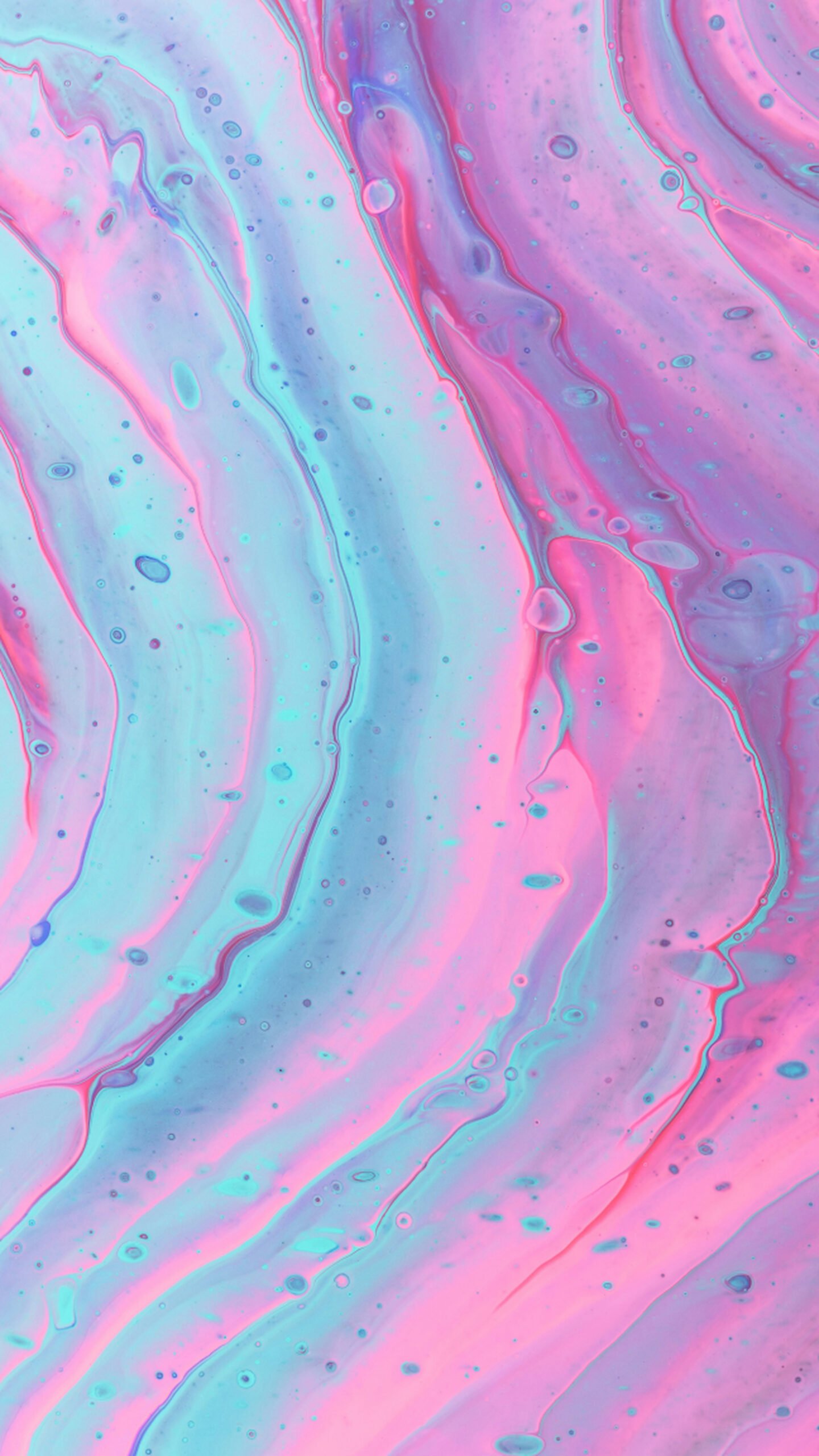 Abstract fluid art wallpaper featuring smooth, swirling waves of pastel pink, magenta, and cyan blue paint creating a marble-like pattern.