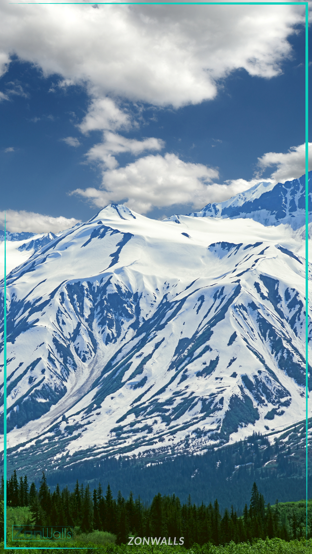 Vertical nature wallpaper featuring a towering snow-capped mountain range under a bright blue sky with fluffy white clouds, overlooking a dense green pine forest at the base.